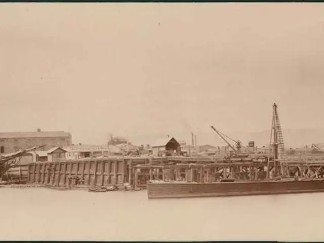 As we can see in the image there is water, boats, buildings, current poles and sky.