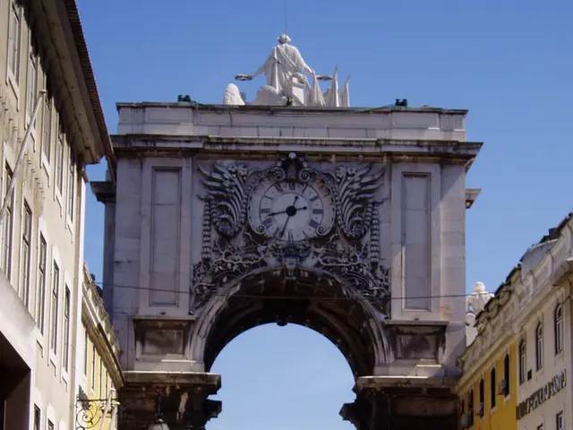 In this image there are a few people walking on the streets, in the background of the image there...