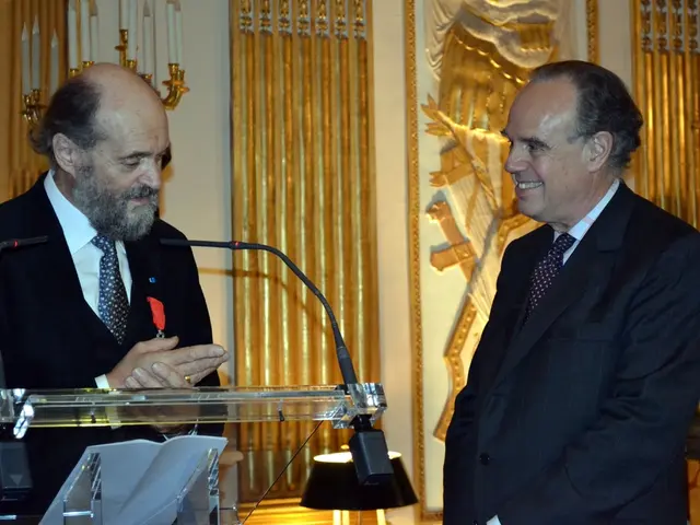 In this image in the front there is a podium and on the top of the podium there are mice and there...